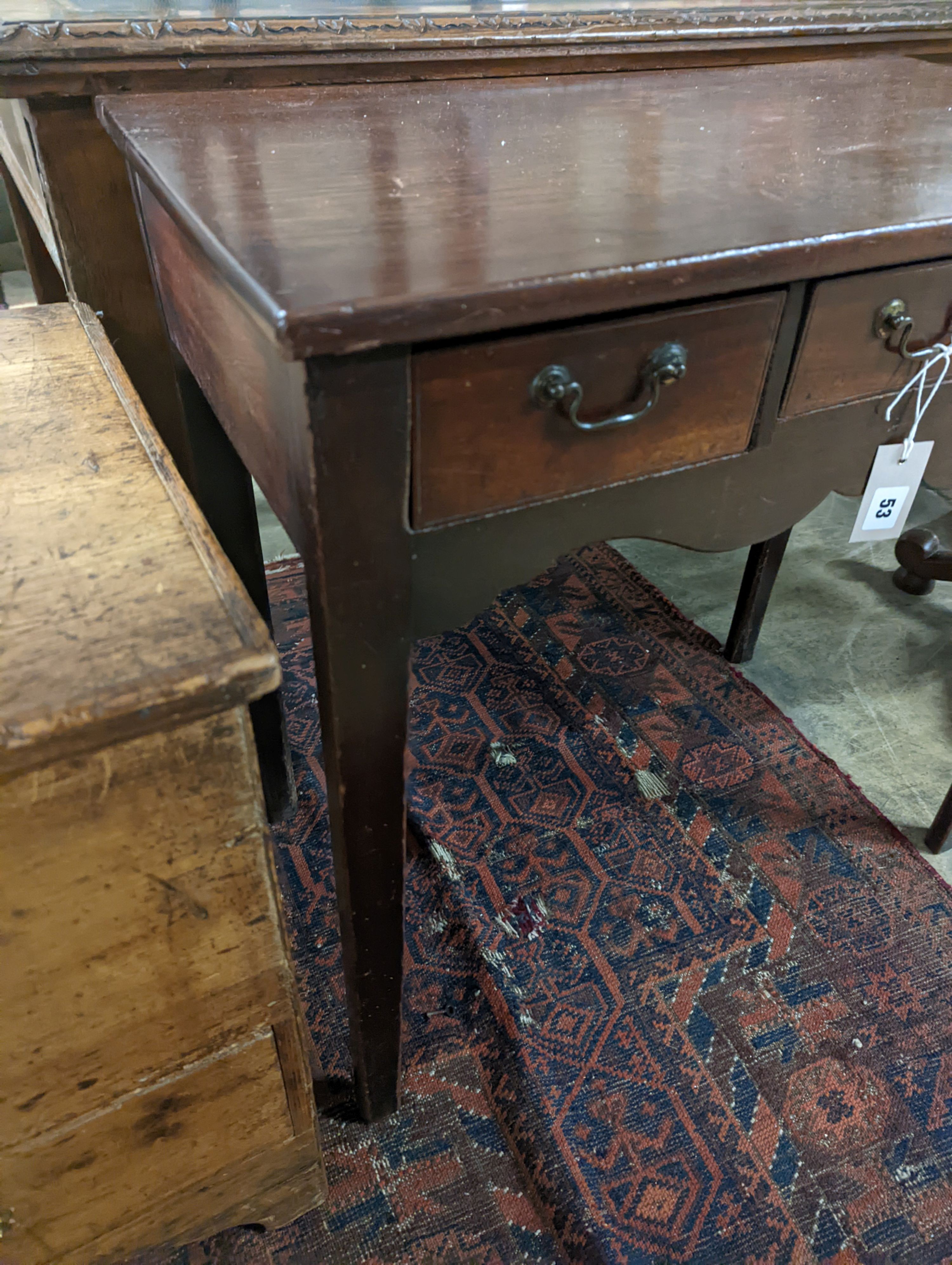 A George III mahogany side table with three drawers, width 75cm, depth 44cm, height 72cm